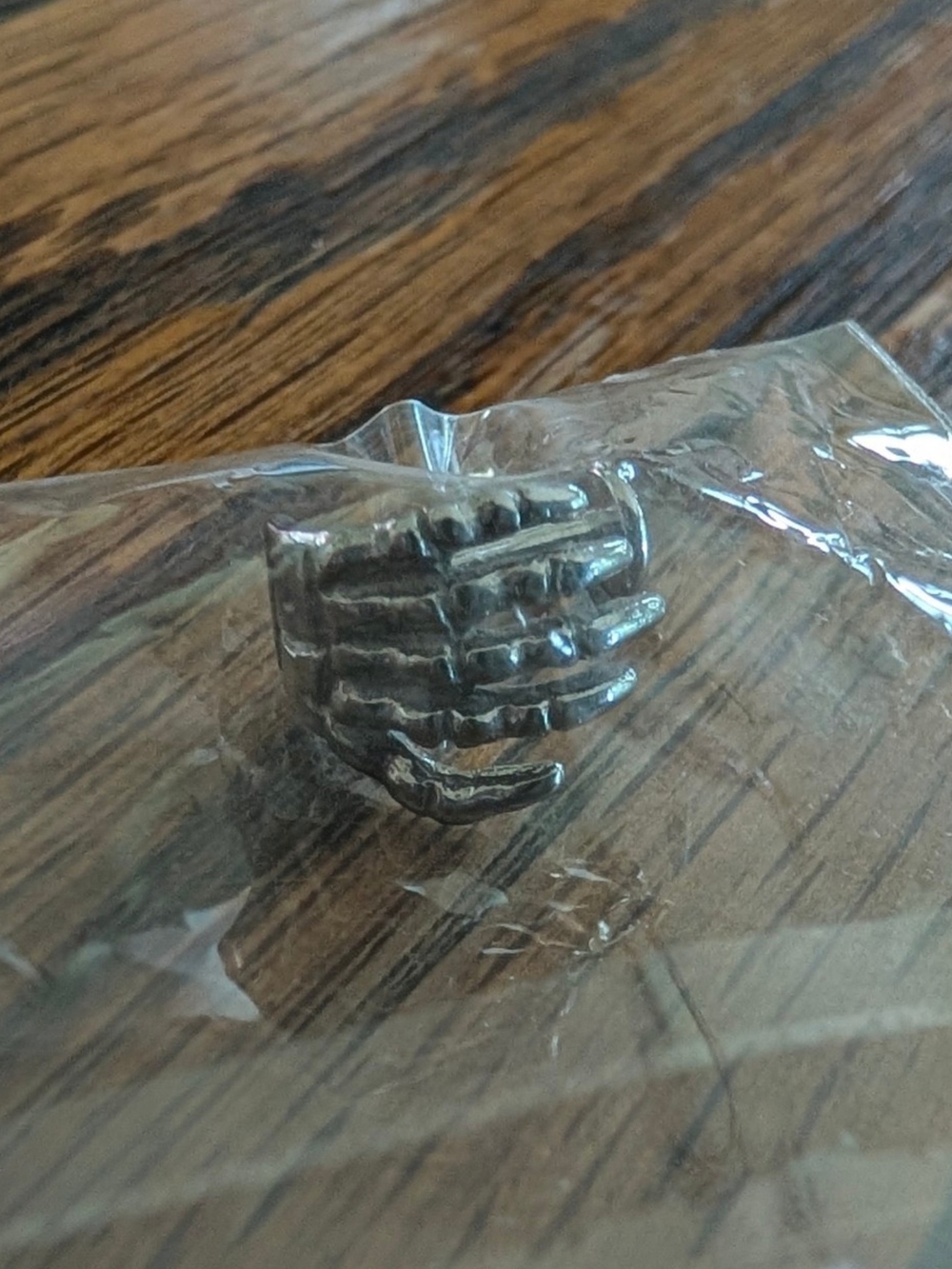 gothic skeleton hand labret stud piercing